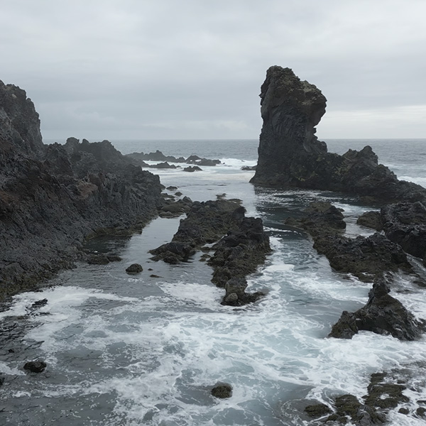 Black pebble beach and lava rock formations at Djúpalónssandur, Iceland