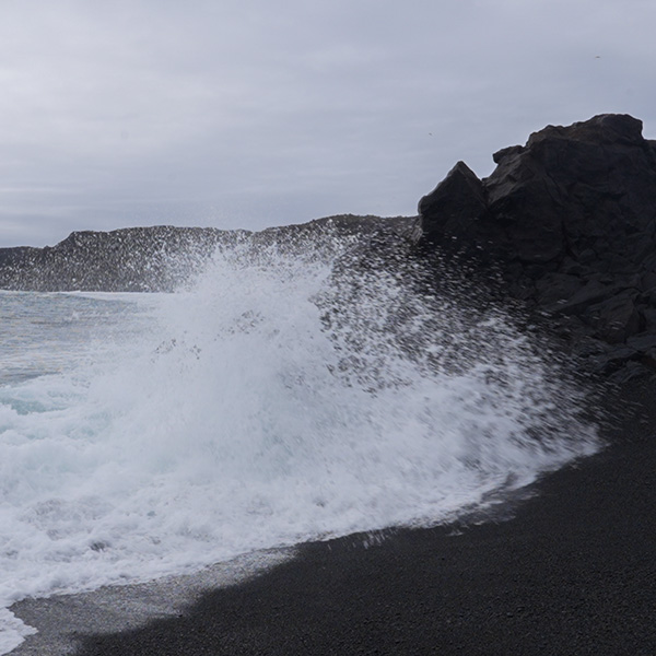 Black pebble beach and lava rock formations at Djúpalónssandur, Iceland