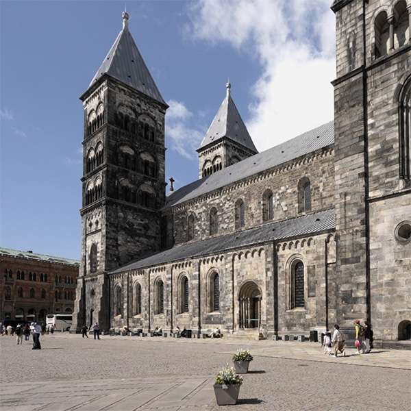 Lund Cathedral and its twin Romanesque towers seen from the square on a June day