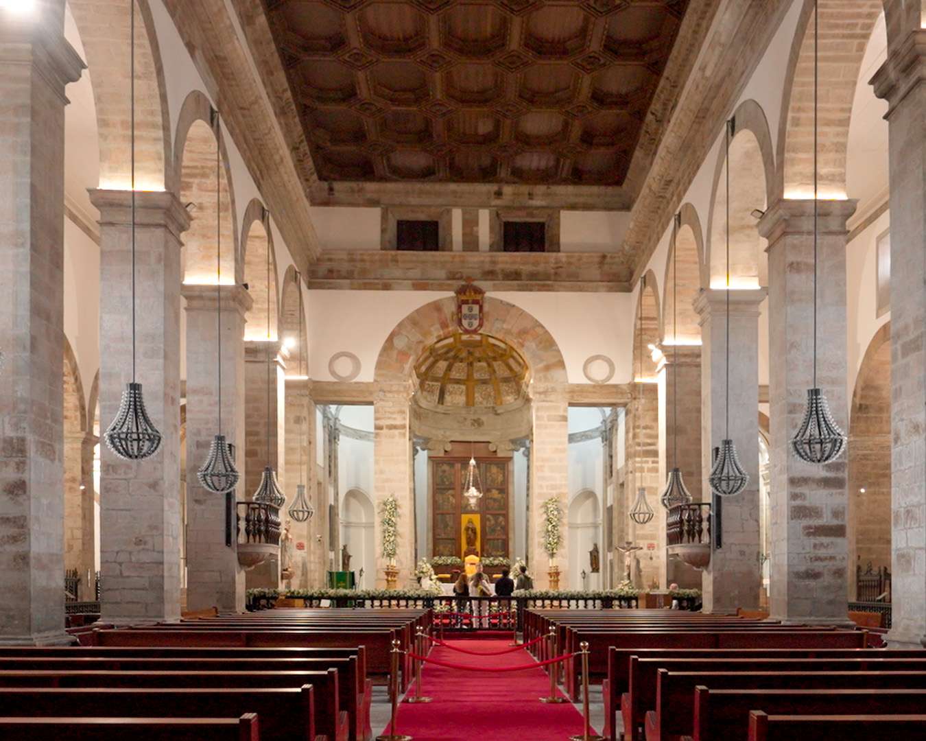 Rebuilt nave of Angra cathedral with its coffered wooden ceiling and stone arcades