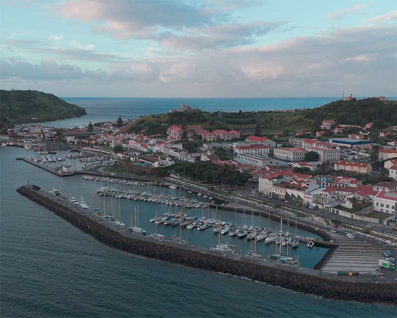 Horta marina and the town from the air with the breakwater enclosing the harbour, Faial