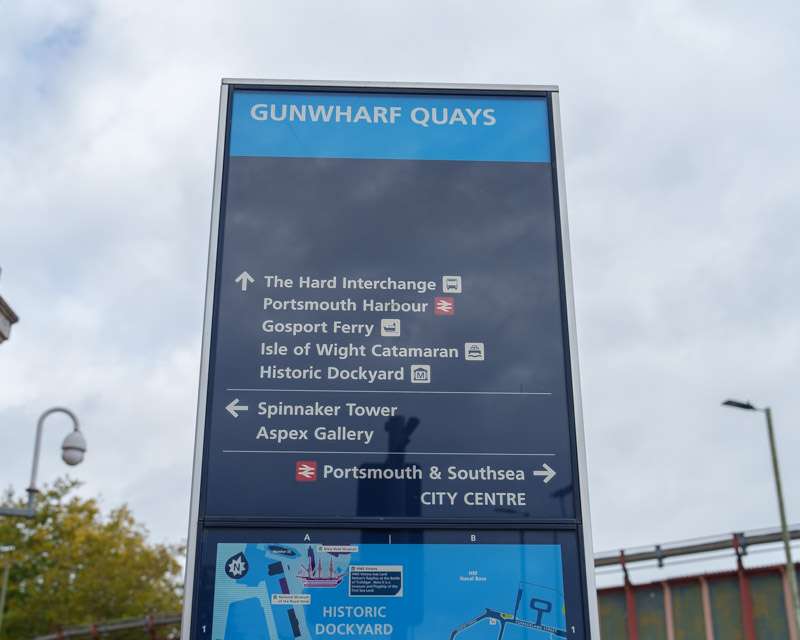 Gunwharf Quays signpost pointing to Historic Dockyard, Gosport Ferry and the city centre