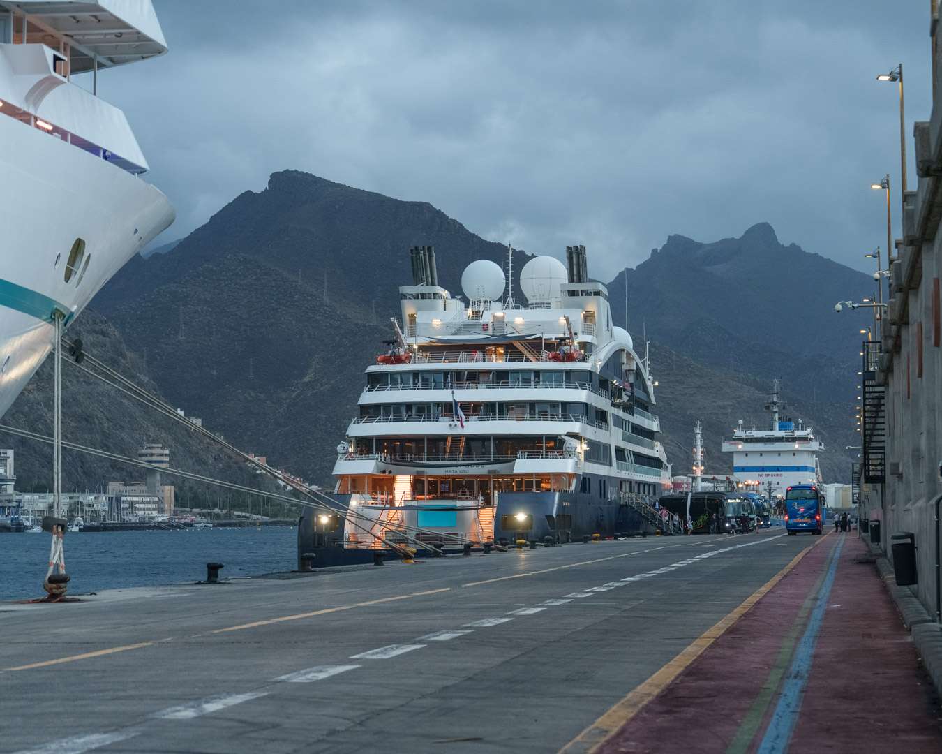 Cruise ship at the Santa Cruz de Tenerife quay before dawn with the Anaga hills behind