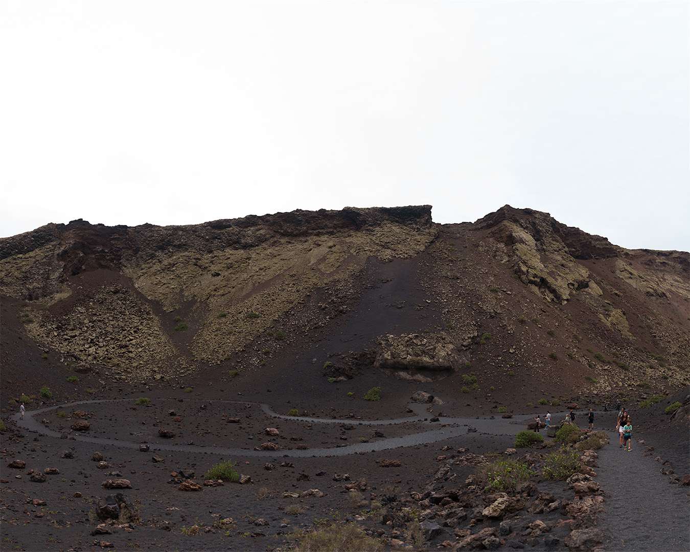 Looking down into the crater of Caldera de los Cuervos with the path across the floor