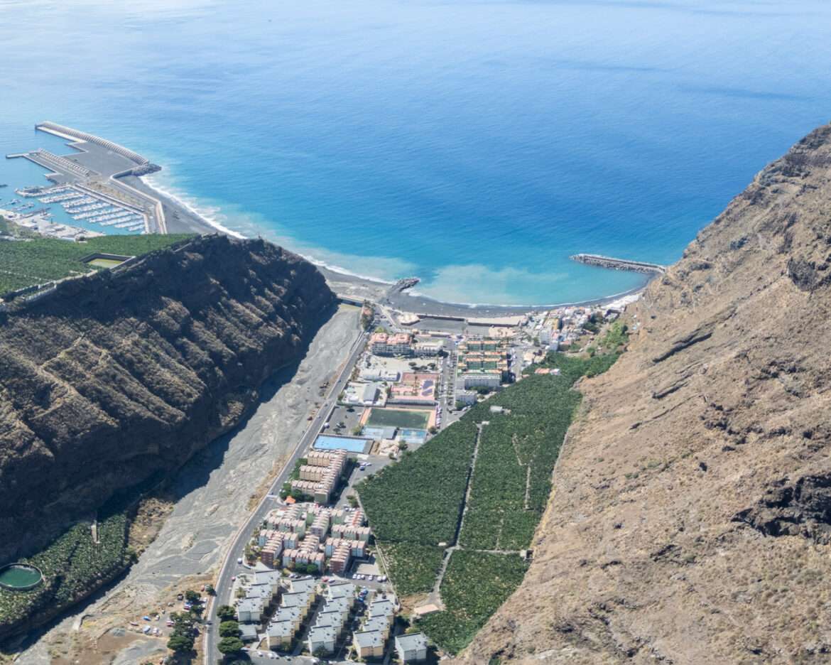 Puerto de Tazacorte seen from above with the breakwater and turquoise water, La Palma