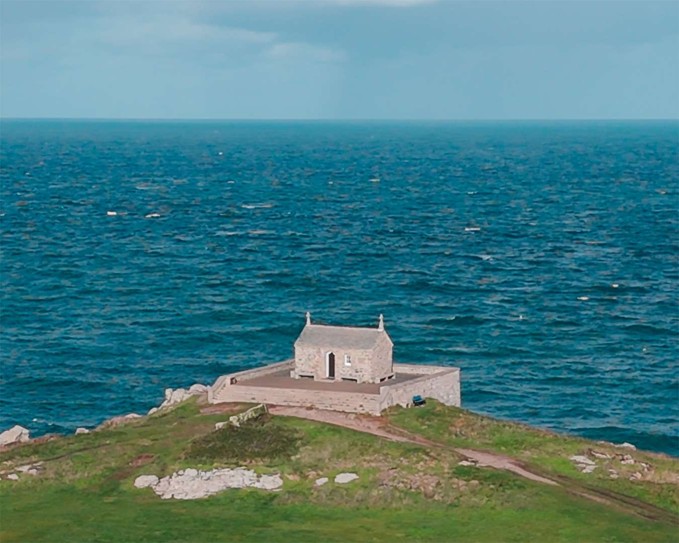 St Nicholas Chapel on the Island headland above the sea at St Ives