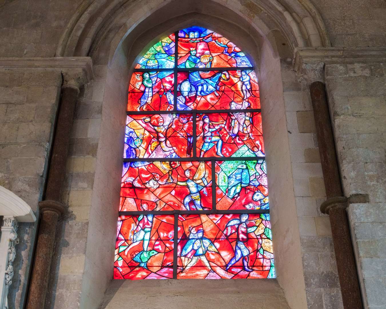 The Marc Chagall window in Chichester Cathedral, red and blue glass celebrating Psalm 150