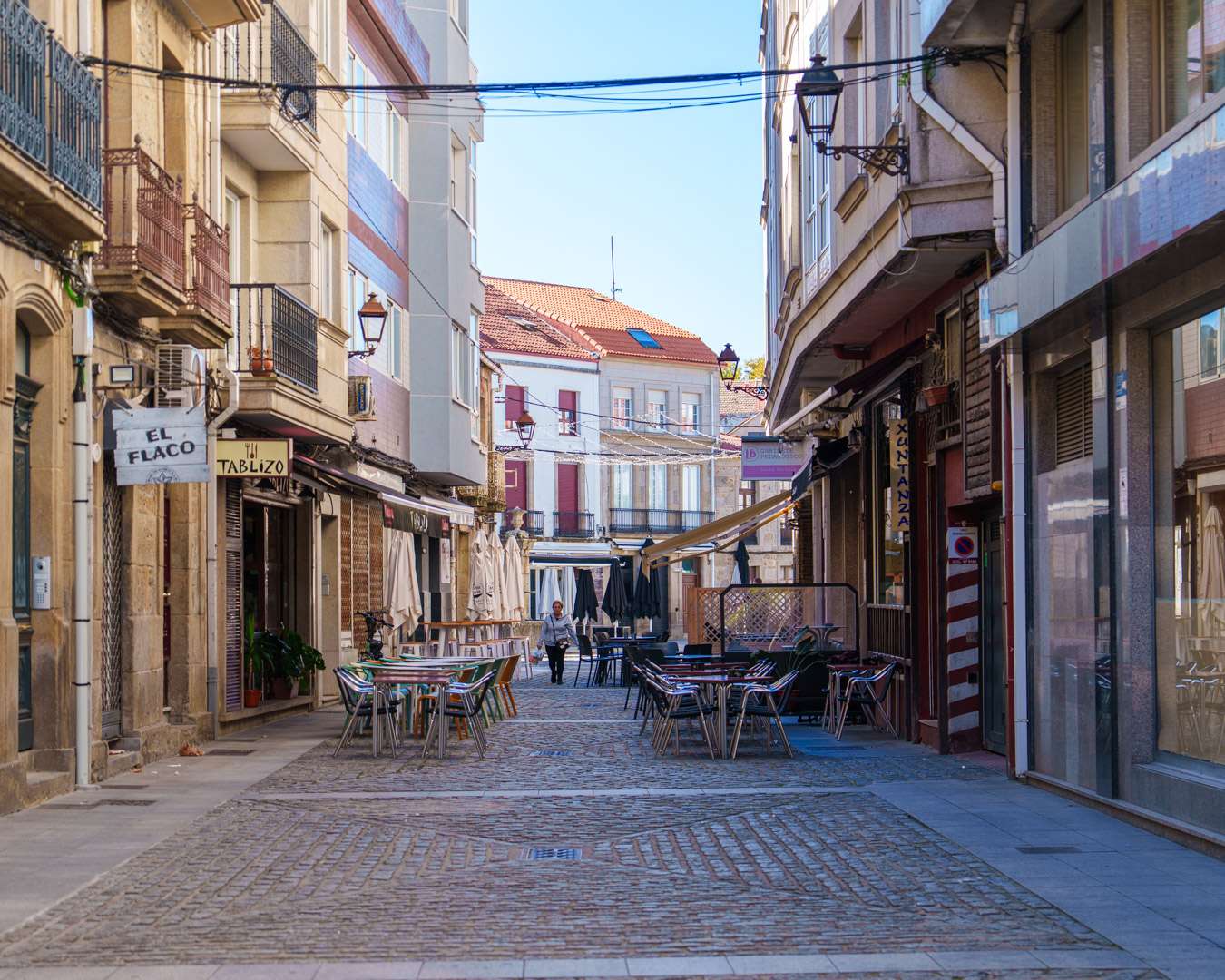 Pedestrian street with café terraces and cobbles in the old town of Vilagarcía de Arousa