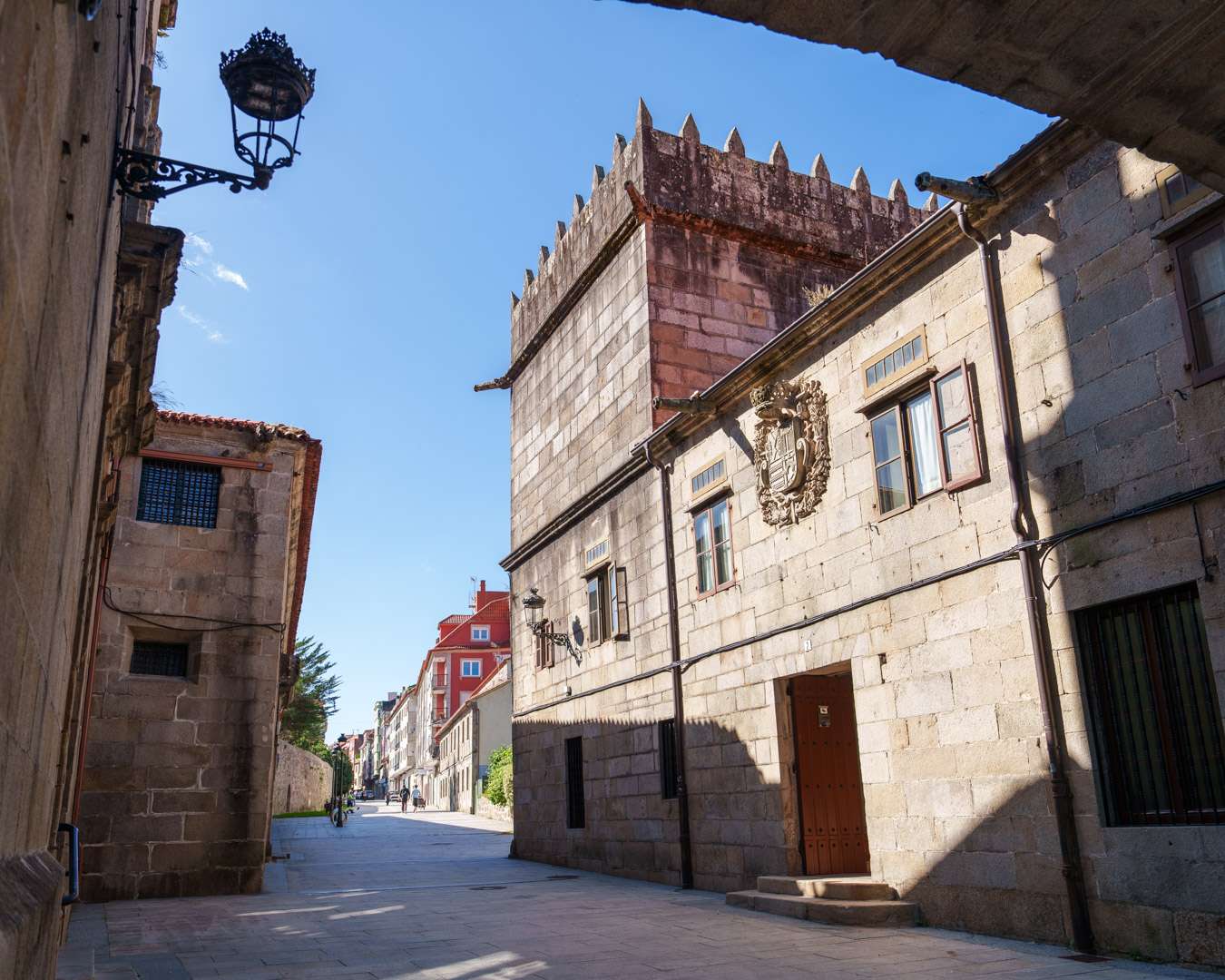 Narrow lane beside the crenellated tower of the Pazo de Vista Alegre in Vilagarcía de Arousa