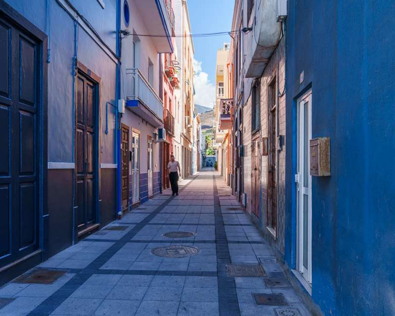 Narrow blue-painted lane in Puerto de Tazacorte, La Palma