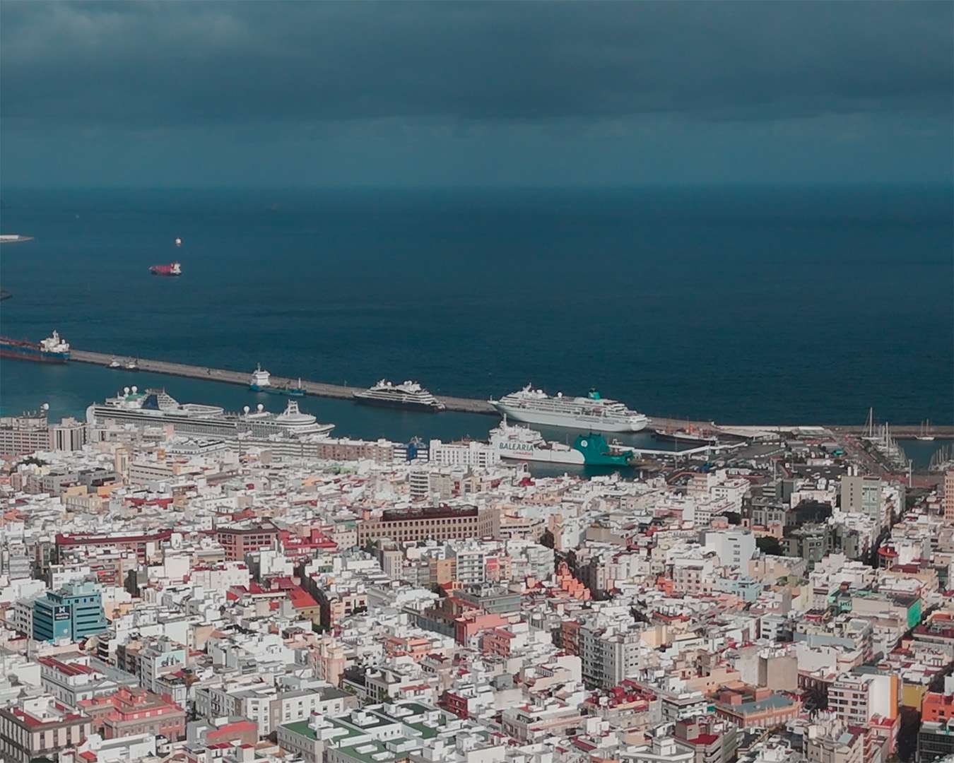 Santa Cruz de Tenerife from the air with cruise ships lying at the quay and the Atlantic beyond