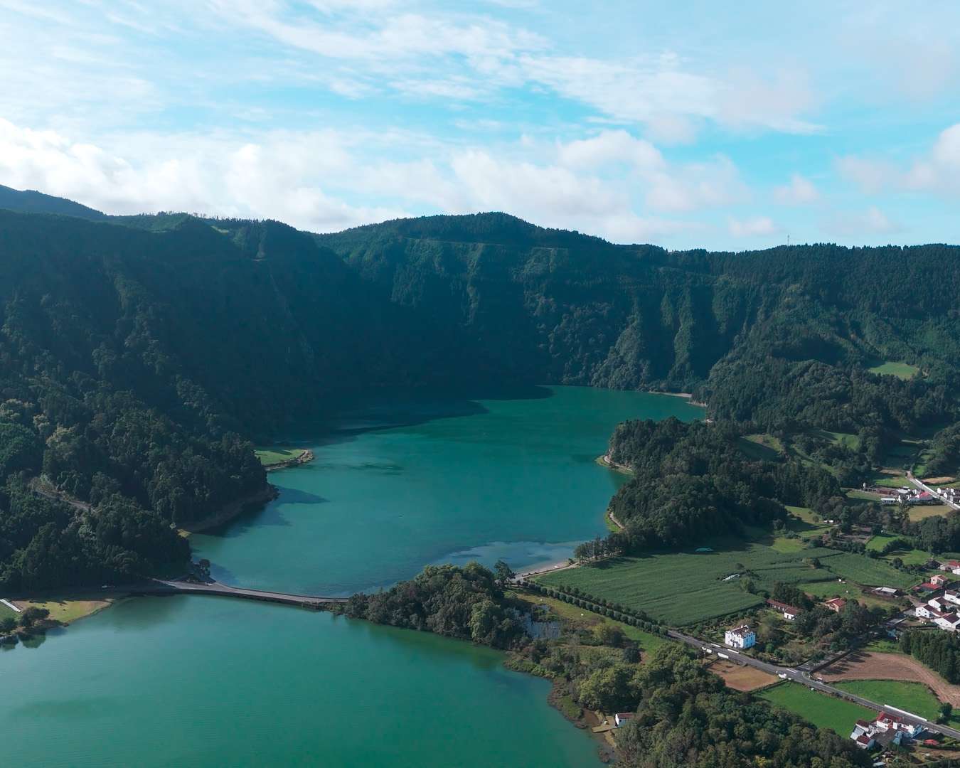 Sete Cidades caldera from the rim with both lakes, the bridge and the village below