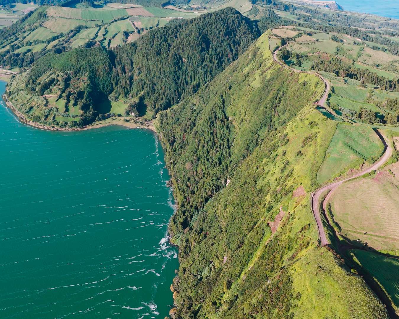 Green coastal ridge and cliffs falling to the Atlantic on the west of São Miguel